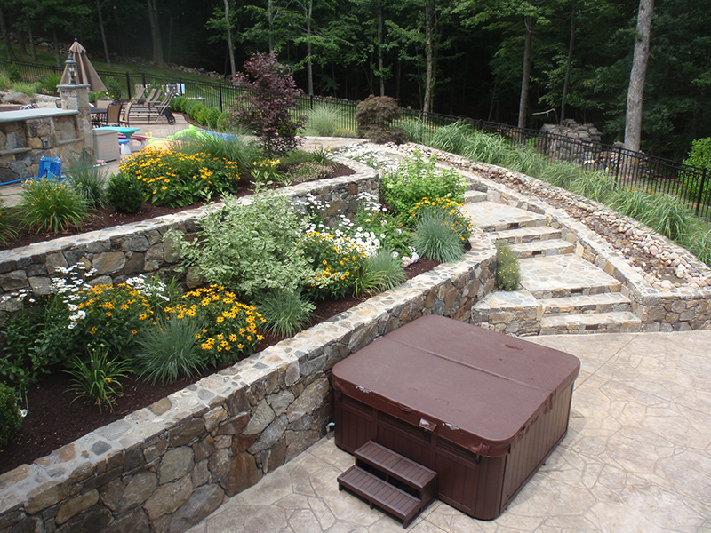 Masonry wall project with natural texture and outdoor living integration